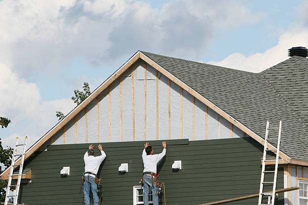 Professional Vinyl Siding technician working in Rougemont, NC